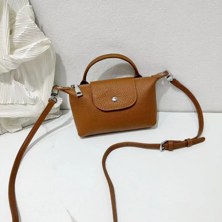 Women’s Mini Leather Crossbody Bag | حقيبة نسائية صغيرة من الجلد بتصميم كروس بودي