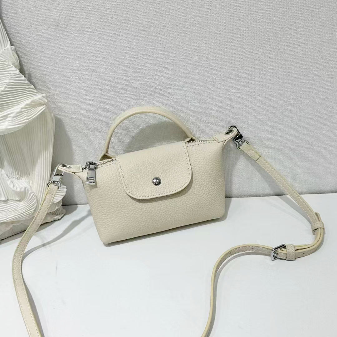 Women’s Mini Leather Crossbody Bag | حقيبة نسائية صغيرة من الجلد بتصميم كروس بودي