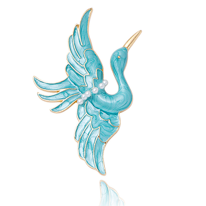 Women’s Blue Crane Enamel Brooch | بروش نسائي أزرق بتصميم طائر الكركي