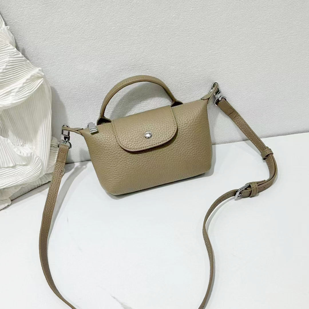 Women’s Mini Leather Crossbody Bag | حقيبة نسائية صغيرة من الجلد بتصميم كروس بودي