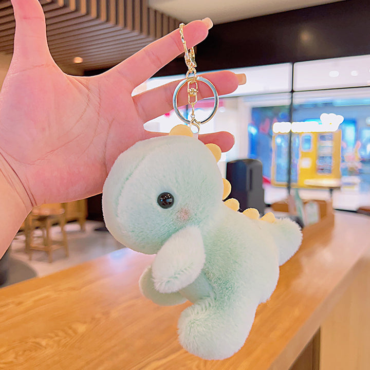 Women’s Plush Dinosaur Bag Charm Keychain | تعليقة حقيبة نسائية بتصميم ديناصور لطيف