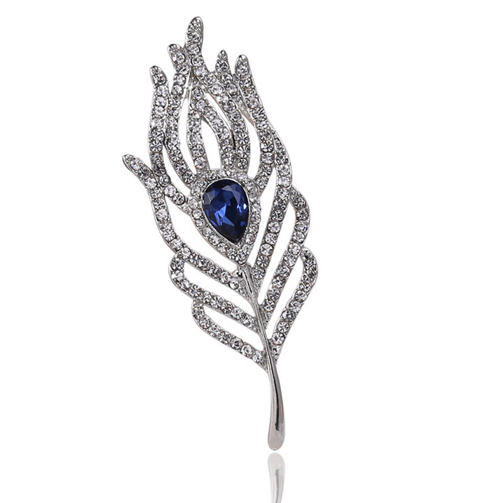 Women’s Rhinestone Feather Brooch | بروش نسائي مرصع بتصميم ريشة أنيقة