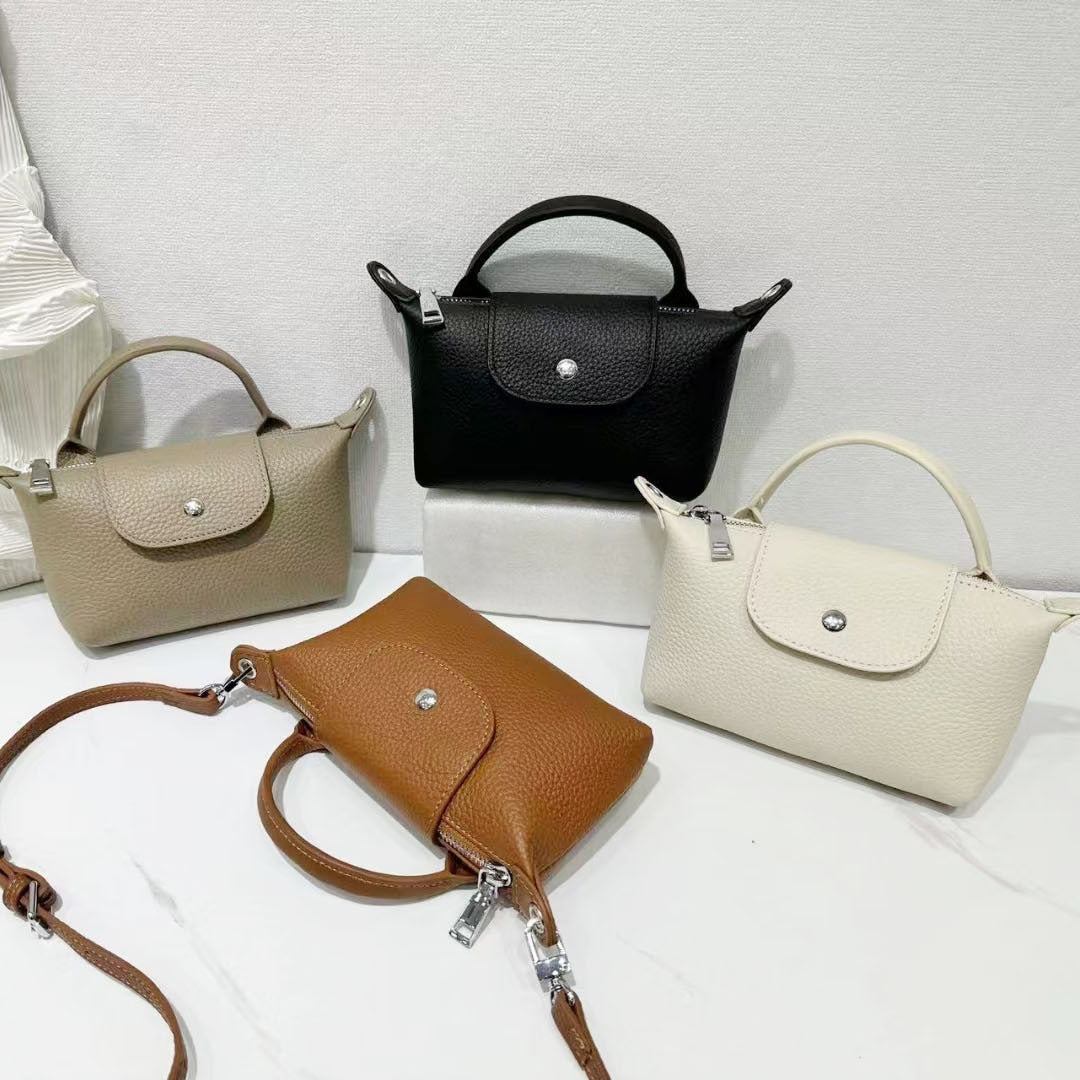 Women’s Mini Leather Crossbody Bag | حقيبة نسائية صغيرة من الجلد بتصميم كروس بودي