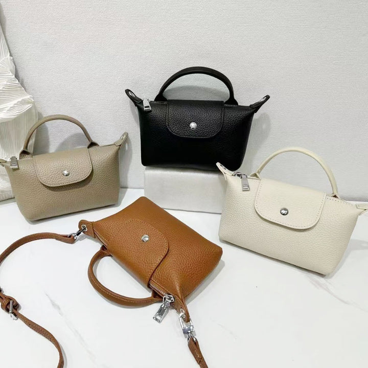 Women’s Mini Leather Crossbody Bag | حقيبة نسائية صغيرة من الجلد بتصميم كروس بودي