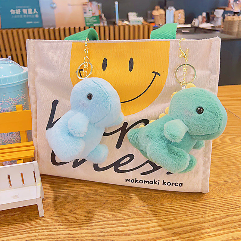 Women’s Plush Dinosaur Bag Charm Keychain | تعليقة حقيبة نسائية بتصميم ديناصور لطيف