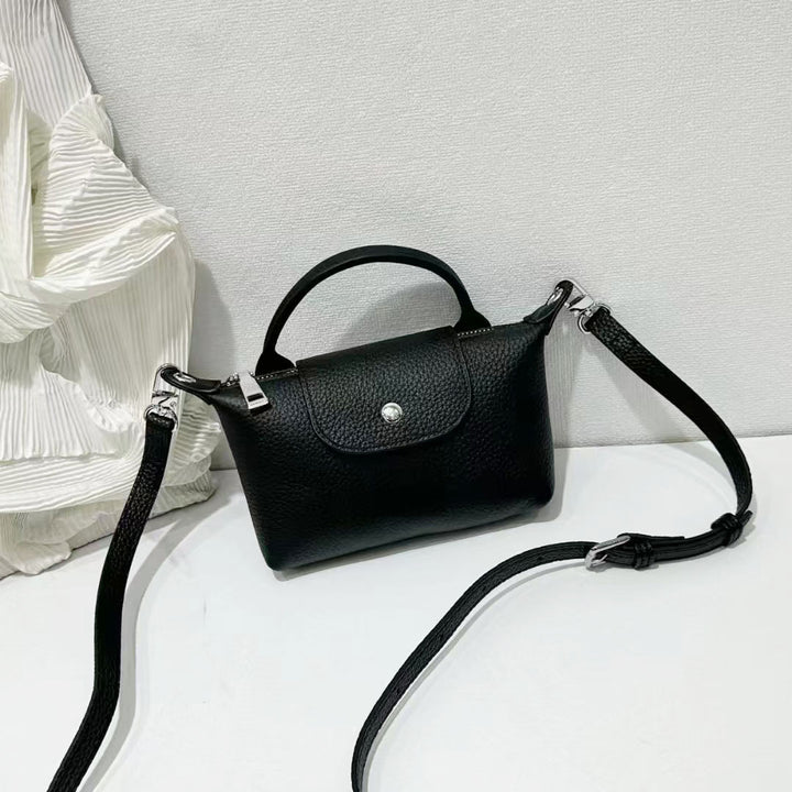 Women’s Mini Leather Crossbody Bag | حقيبة نسائية صغيرة من الجلد بتصميم كروس بودي