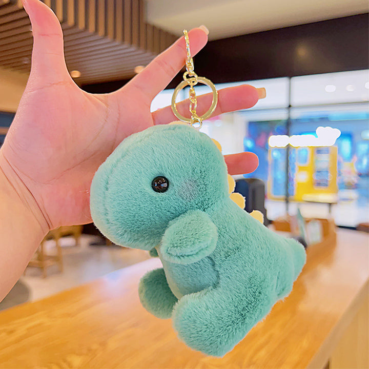 Women’s Plush Dinosaur Bag Charm Keychain | تعليقة حقيبة نسائية بتصميم ديناصور لطيف