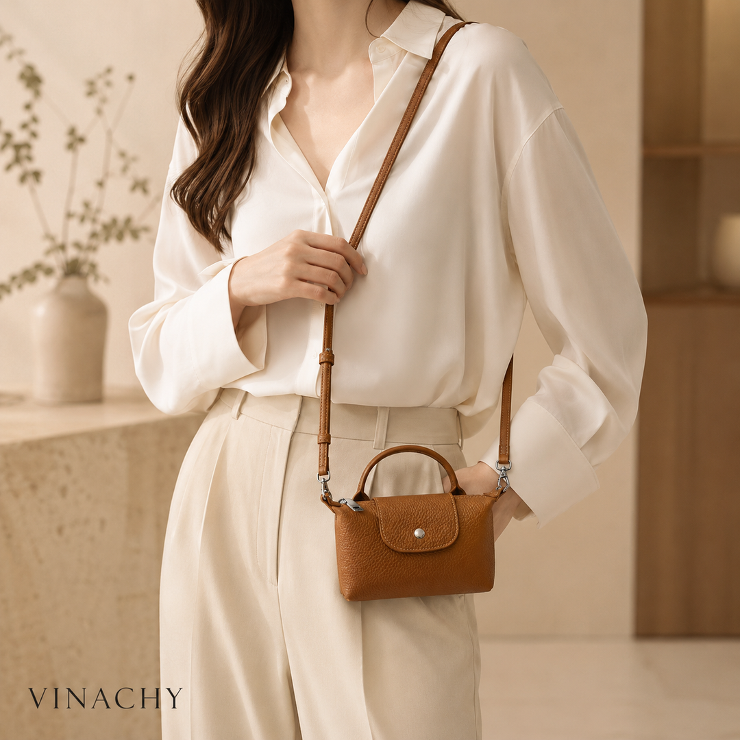 Women’s Mini Leather Crossbody Bag | حقيبة نسائية صغيرة من الجلد بتصميم كروس بودي