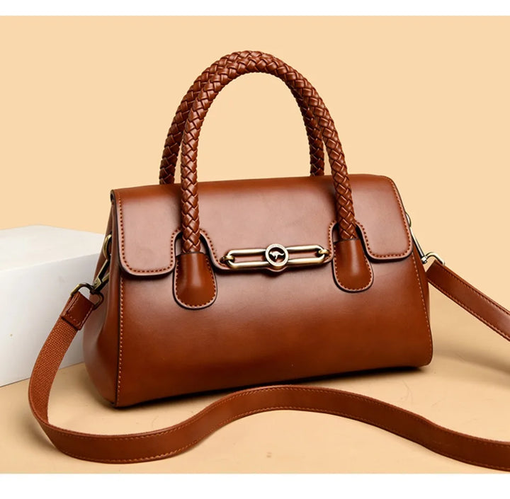 Women’s Woven-Handle Leather Handbag | حقيبة جلد نسائية بمقبض منسوج