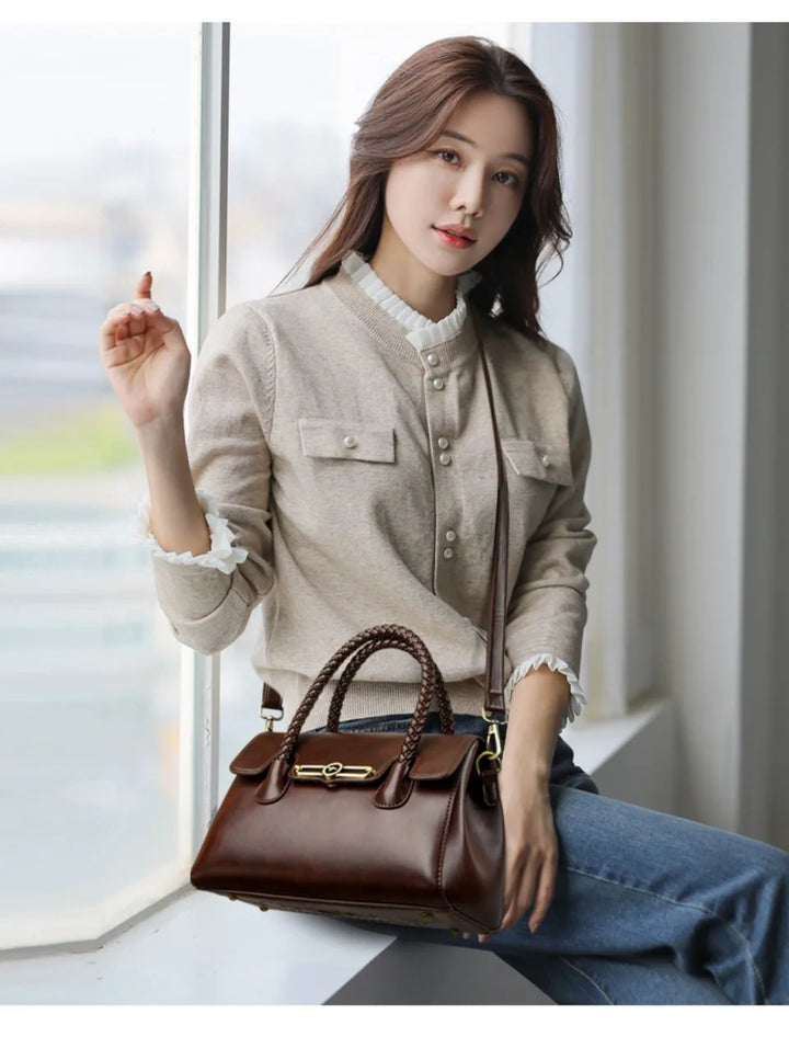 Women’s Woven-Handle Leather Handbag | حقيبة جلد نسائية بمقبض منسوج