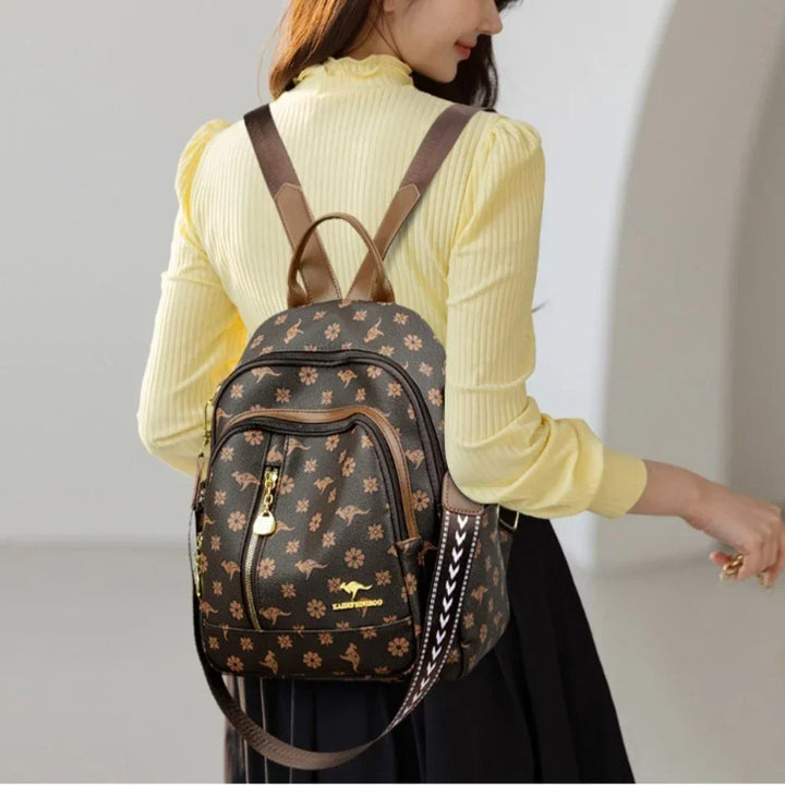 Women’s Leather-Look Travel Backpack | حقيبة ظهر نسائية أنيقة للسفر