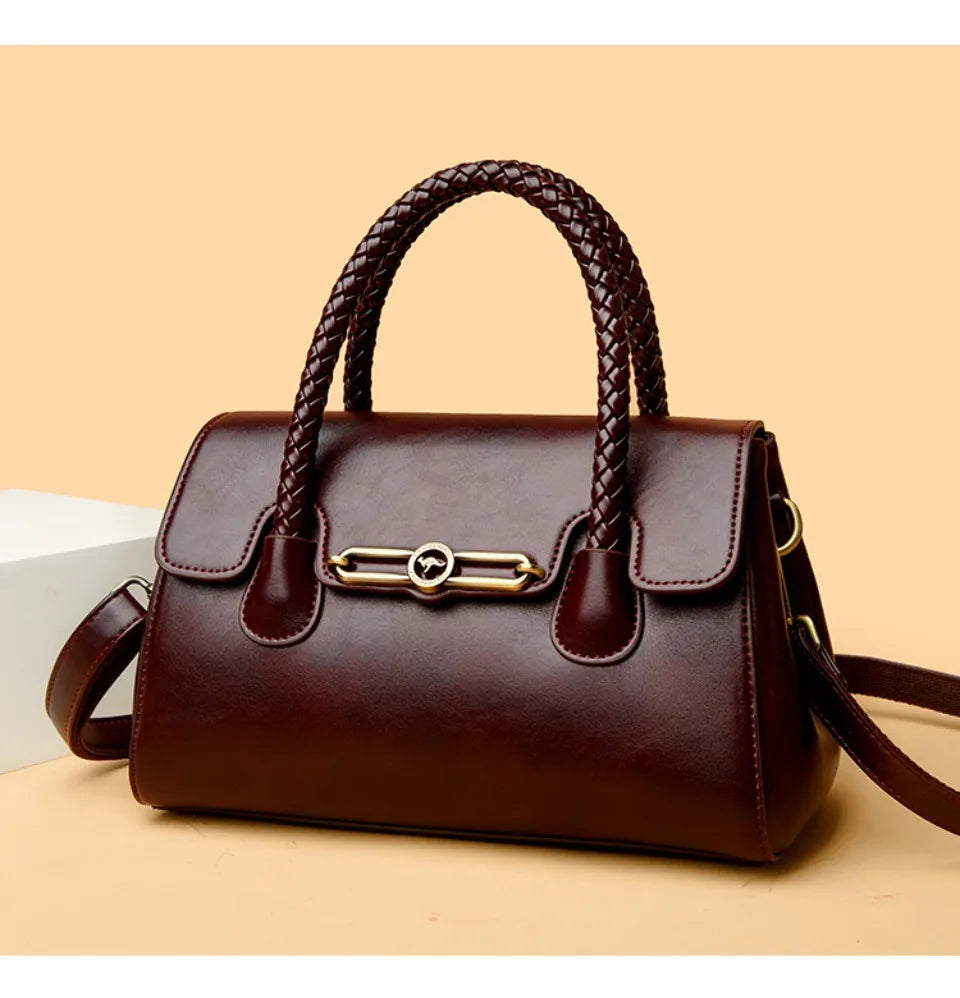 Women’s Woven-Handle Leather Handbag | حقيبة جلد نسائية بمقبض منسوج