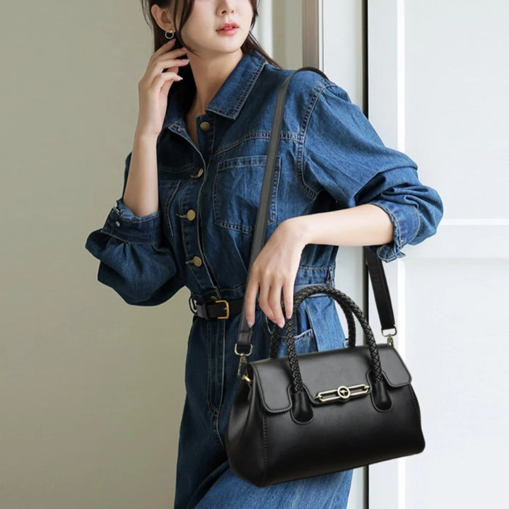 Women’s Woven-Handle Leather Handbag | حقيبة جلد نسائية بمقبض منسوج