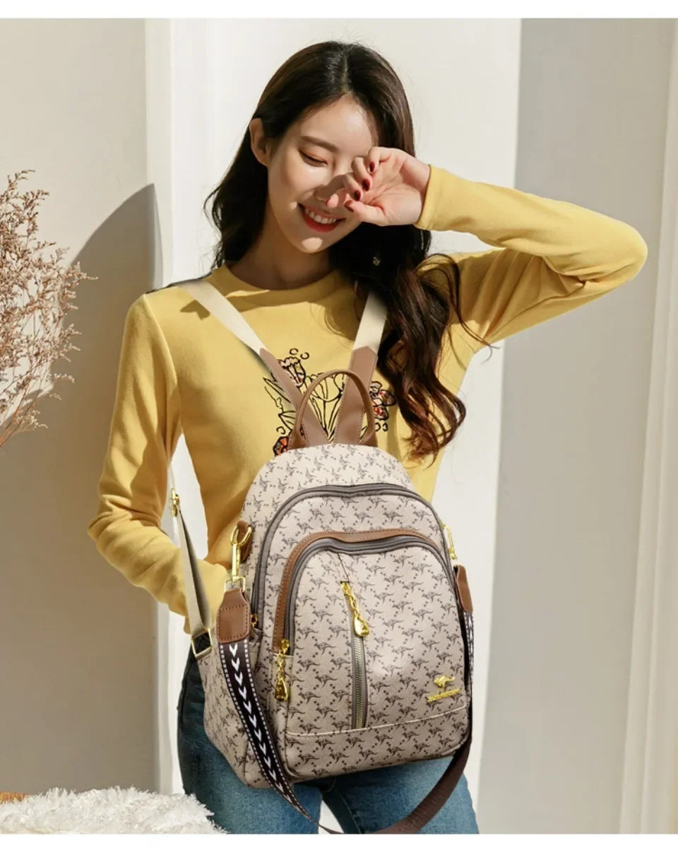 Women’s Leather-Look Travel Backpack | حقيبة ظهر نسائية أنيقة للسفر