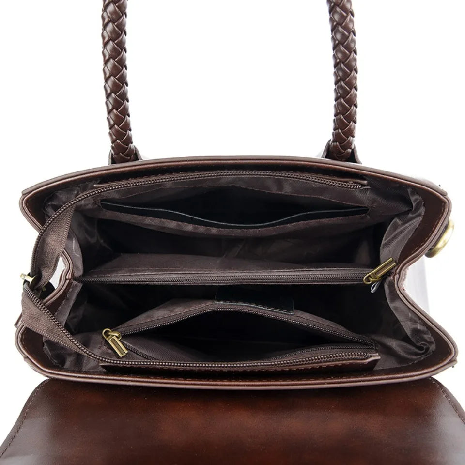 Women’s Woven-Handle Leather Handbag | حقيبة جلد نسائية بمقبض منسوج