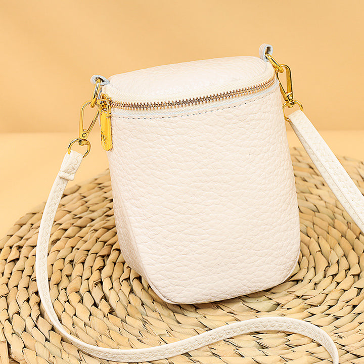 Women’s Shell Leather Crossbody Phone Bag | حقيبة هاتف نسائية جلدية بتصميم صدفة