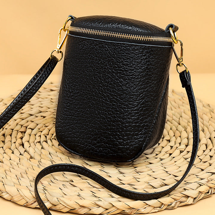 Women’s Shell Leather Crossbody Phone Bag | حقيبة هاتف نسائية جلدية بتصميم صدفة