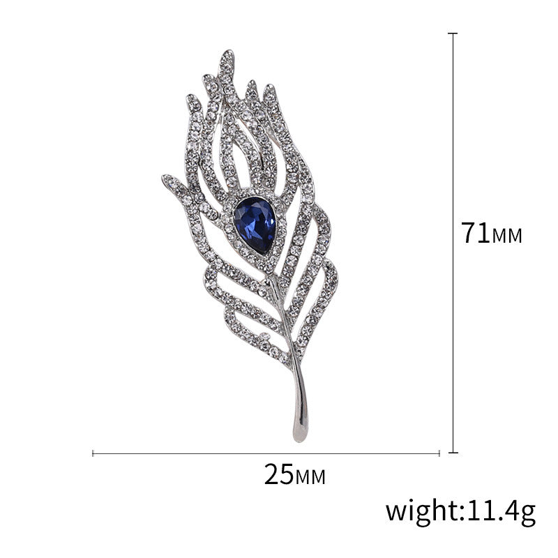 Women’s Rhinestone Feather Brooch | بروش نسائي مرصع بتصميم ريشة أنيقة