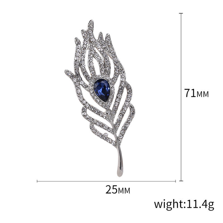 Women’s Rhinestone Feather Brooch | بروش نسائي مرصع بتصميم ريشة أنيقة