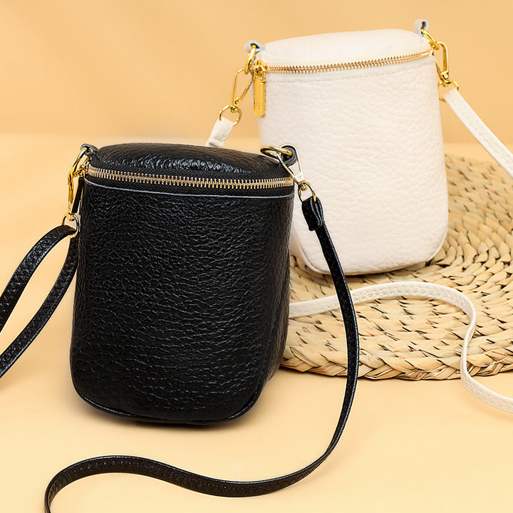 Women’s Shell Leather Crossbody Phone Bag | حقيبة هاتف نسائية جلدية بتصميم صدفة