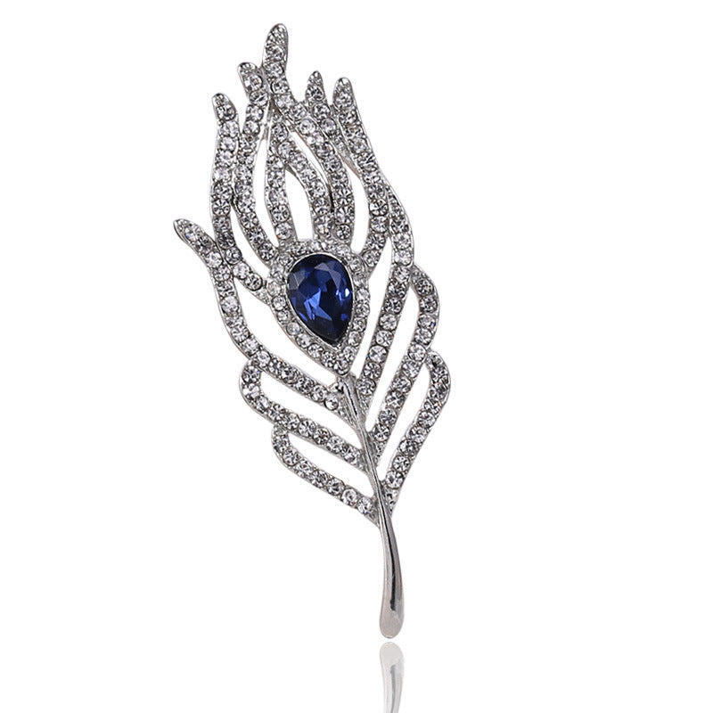 Women’s Rhinestone Feather Brooch | بروش نسائي مرصع بتصميم ريشة أنيقة